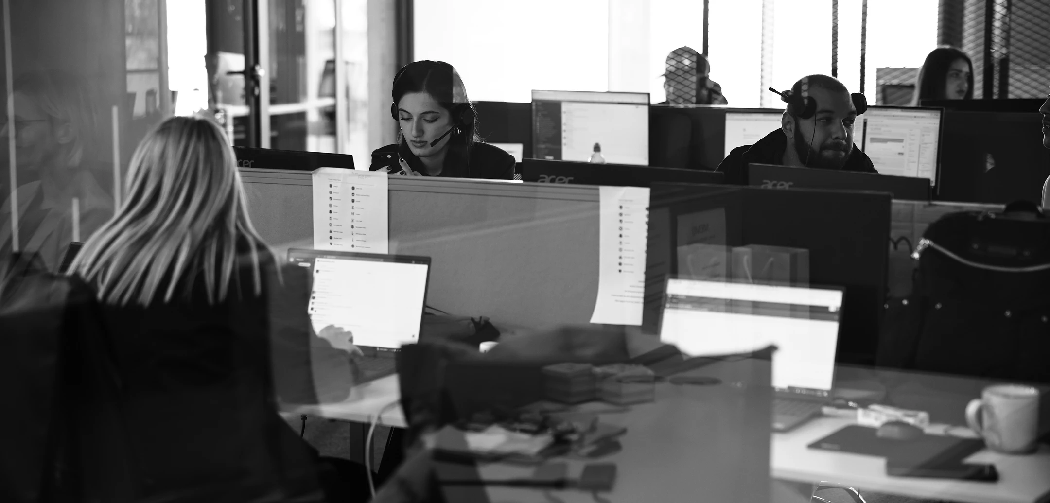 Dedicated customer service agents providing support in a modern office environment