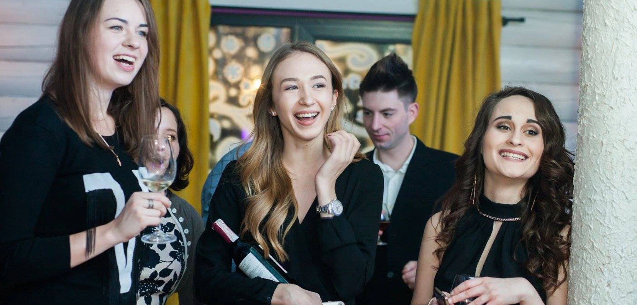 Helpware team celebrating success at a formal company event