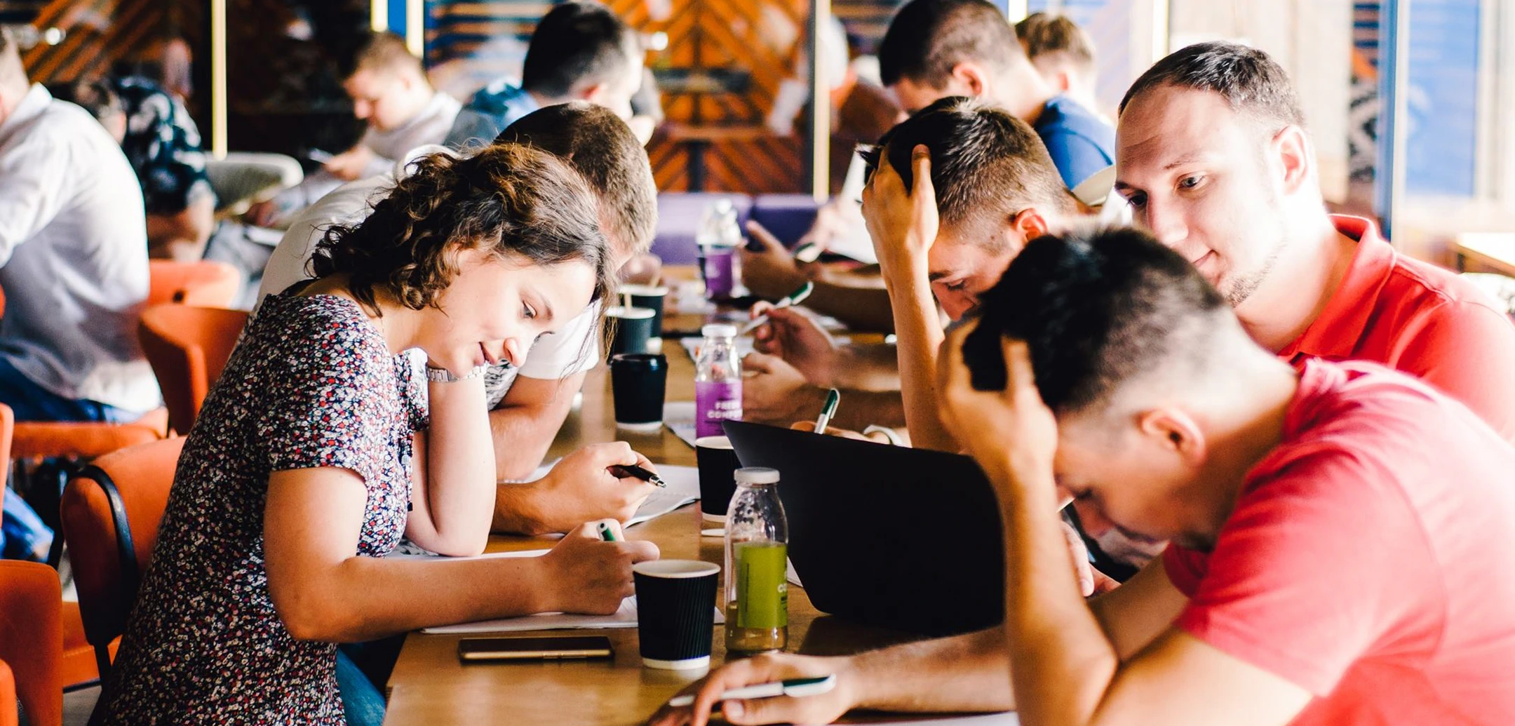 Group of people working collaboratively.