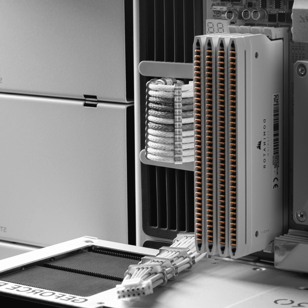 Close-up of computer hardware showing RAM modules and neatly organized cables