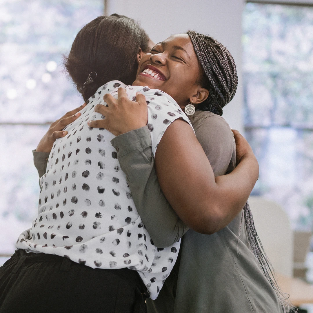 Two women embracing