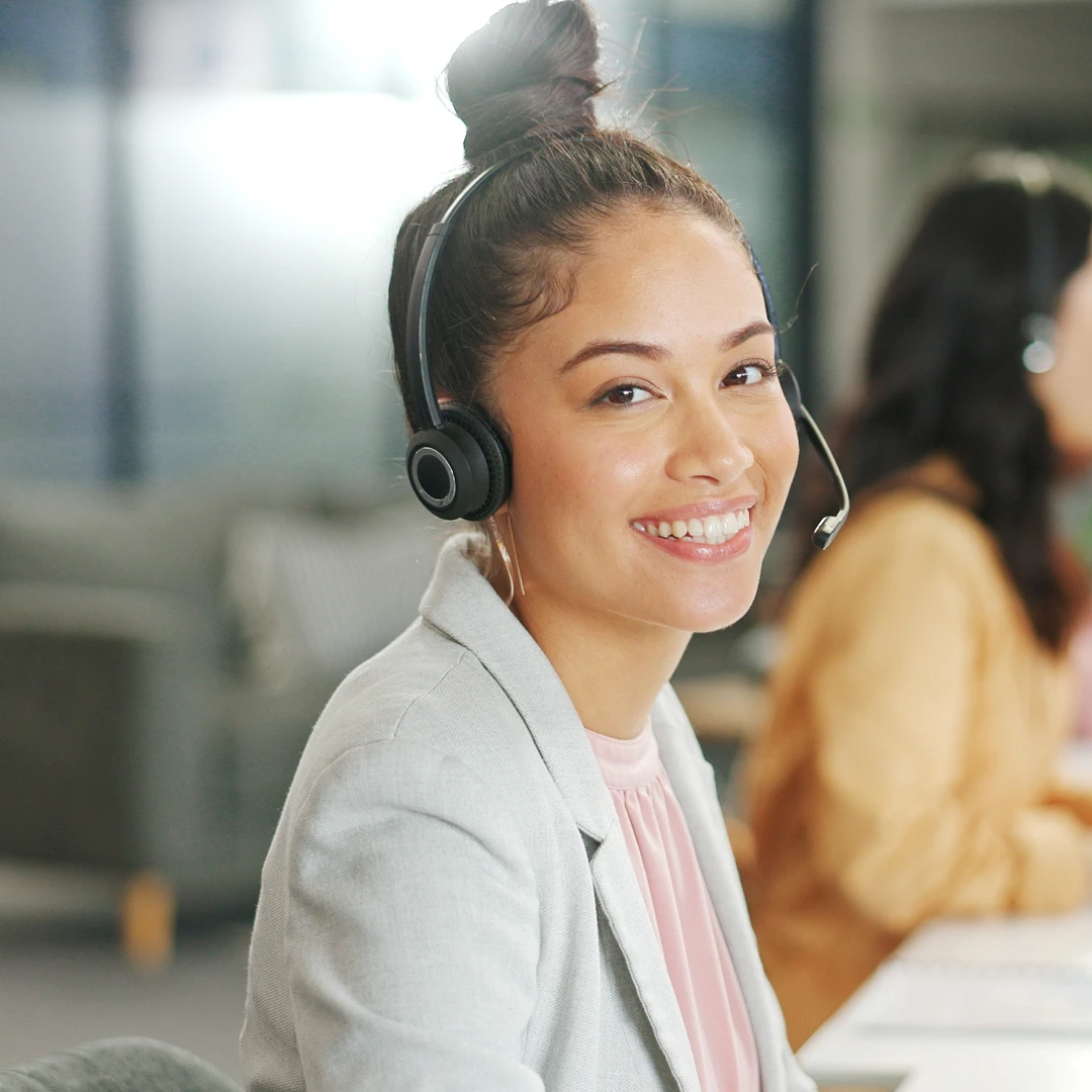 Cheerful, professional agent in a call center in Indianapolis