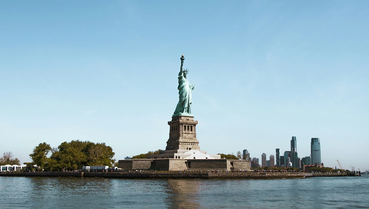 Statue of Liberty with New York City skyline in the background