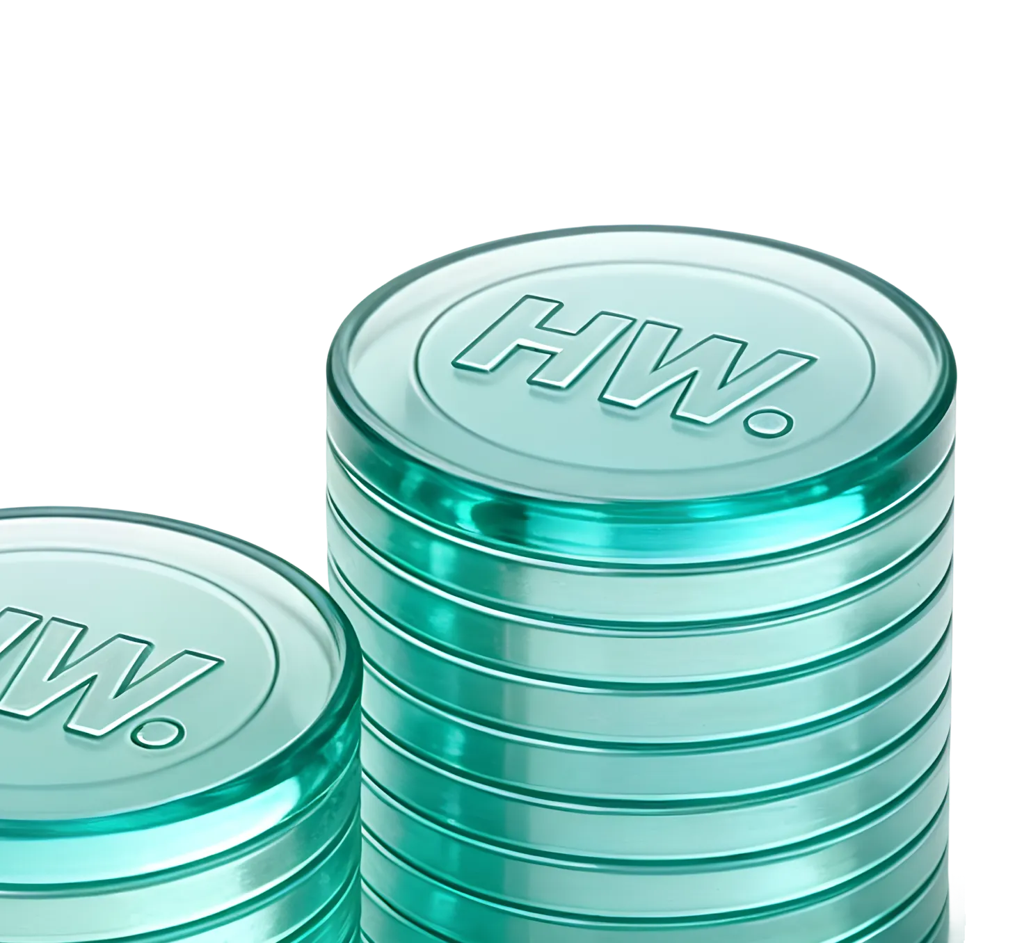 Two stacks of coins with the “HW” logo imprinted on them