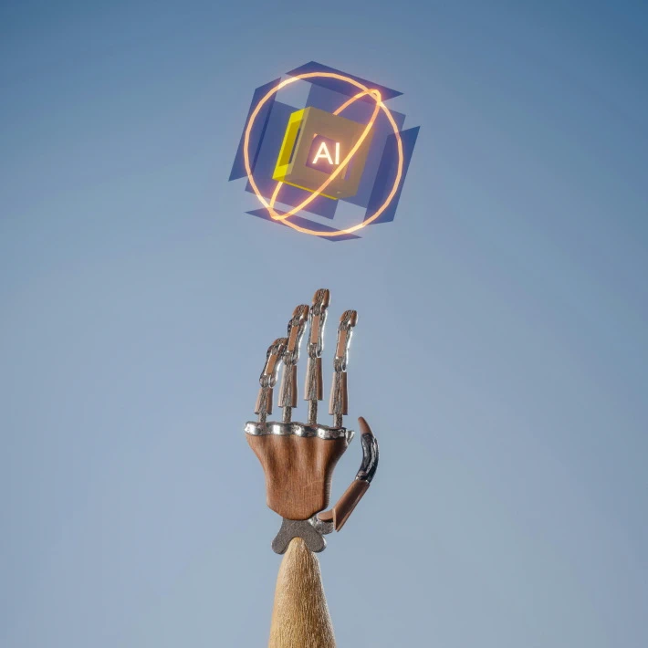 a robot arm trying to reach a box with AI on it