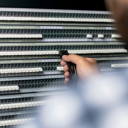 a man trying to plug something