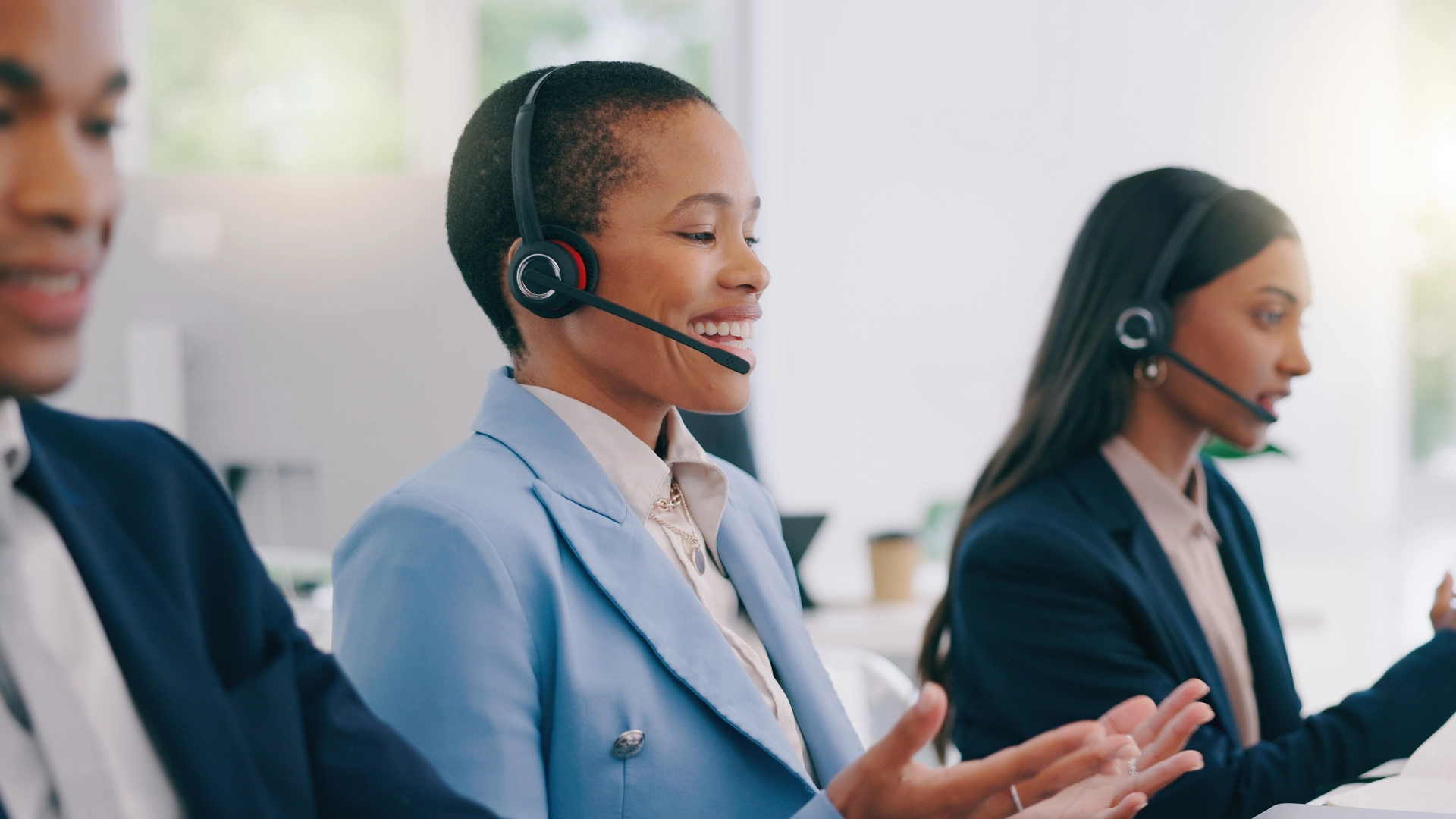 Call center agents with headsets.