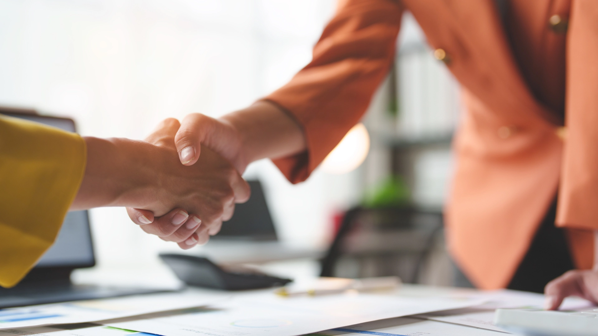 A handshake representing collaboration and partnership.